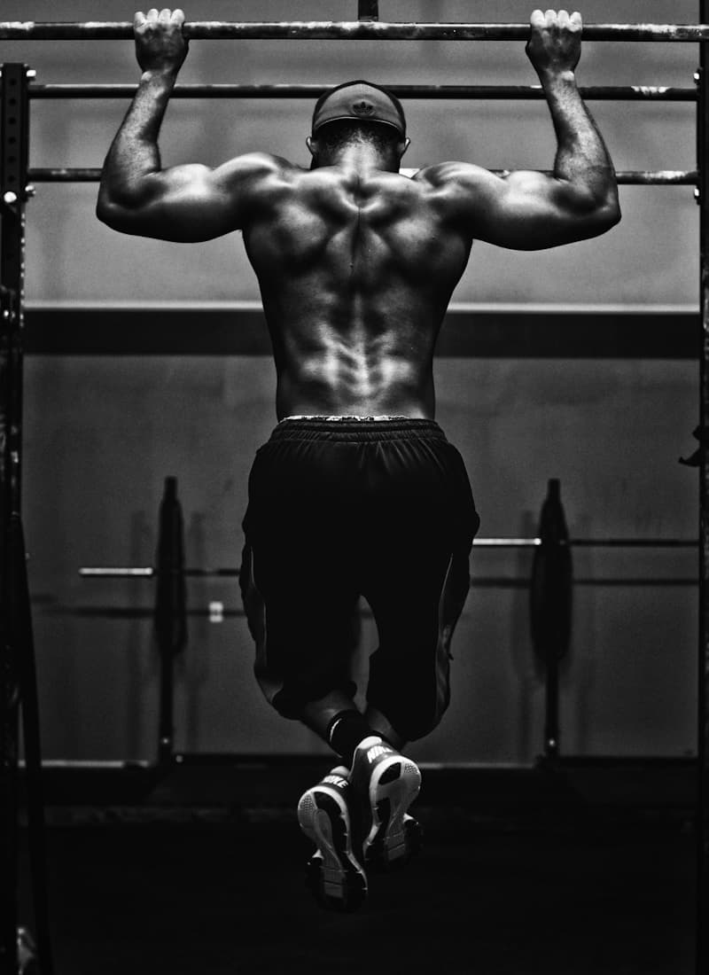 Athlete doing pull-ups — strength in motion